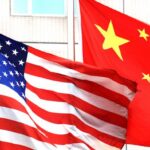 The flags of the US and the People's Republic of China fly. Photo: Times Asi/Flickr.