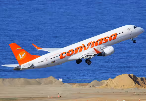 A Conviasa Embraer 190-AR jet lifting off from the Simón Bolívar Airport serving Caracas, 2014. Photo: Orlando Suarez/File photo.