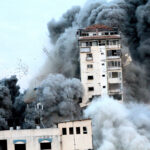 Smoke and flames billow after Israeli forces struck a high-rise tower in Gaza City, Oct. 7. Photo: Palestinian News & Information Agency, Wafa, for APAimages.