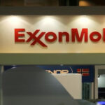 ExxonMobil logo on a gas station. File photo.
