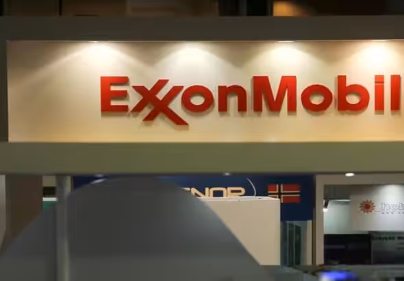 ExxonMobil logo on a gas station. File photo.