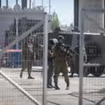 Israeli occupation forces at the Qalandiya Checkpoint near Ramallah on July 26, 2016. Photo: WAFA.