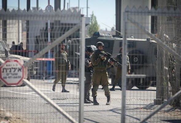 Israeli occupation forces at the Qalandiya Checkpoint near Ramallah on July 26, 2016. Photo: WAFA.