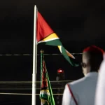 Flag of Guyana raised in the disputed Essequibo territory by Guyanese President Irfaan Ali in a military event. Photo: BNN.