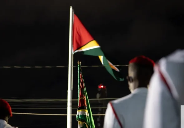Flag of Guyana raised in the disputed Essequibo territory by Guyanese President Irfaan Ali in a military event. Photo: BNN.