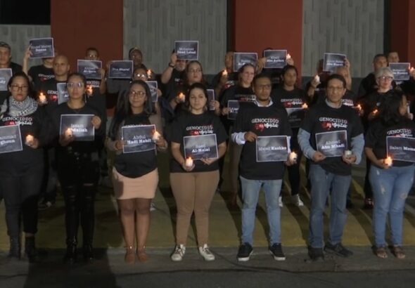 Telesur employees pay tribute to the journalists assassinated by the Israeli occupation in Gaza. Photo: Telesur.