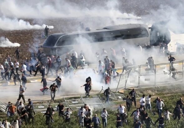 Protesters clash with riot police during a demonstration outside the US-Turkish Incirlik Air Base in Adana, Türkiye, November 5, 2023 Photot: AP/Mehmet Sancakzade.