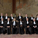 The Judges of the International Court of Justice (as of 31 December 2011), in The Hague, Netherlands. Pictured front, from left: Ronny Abraham (France); Awn Shawkat Al-Khasawneh (Jordan); Vice-President of the Court, Peter Tomka (Slovakia); President of the Court, Hisashi Owada (Japan); Abdul G. Koroma (Sierra Leone); Bruno Simma (Germany); and Kenneth Keith (New Zealand). Back row, from left: Joan E. Donoghue (United States of America); Christopher Greenwood (United Kingdom); Antônio Augusto Cançado Trindade (Brazil); Mohamed Bennouna (Morocco); Bernardo Sepúlveda-Amor (Mexico); Leonid Skotnikov (Russian Federation); Abdulqawi Ahmed Yusuf (Somalia); Xue Hanqin (China); and Philippe Couvreur (Belgium), Registrar of the Court. Photo: Rob Ris/ICJ/UN Photo/File photo.