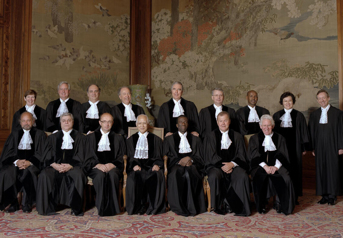 The Judges of the International Court of Justice (as of 31 December 2011), in The Hague, Netherlands. Pictured front, from left: Ronny Abraham (France); Awn Shawkat Al-Khasawneh (Jordan); Vice-President of the Court, Peter Tomka (Slovakia); President of the Court, Hisashi Owada (Japan); Abdul G. Koroma (Sierra Leone); Bruno Simma (Germany); and Kenneth Keith (New Zealand). Back row, from left: Joan E. Donoghue (United States of America); Christopher Greenwood (United Kingdom); Antônio Augusto Cançado Trindade (Brazil); Mohamed Bennouna (Morocco); Bernardo Sepúlveda-Amor (Mexico); Leonid Skotnikov (Russian Federation); Abdulqawi Ahmed Yusuf (Somalia); Xue Hanqin (China); and Philippe Couvreur (Belgium), Registrar of the Court. Photo: Rob Ris/ICJ/UN Photo/File photo.