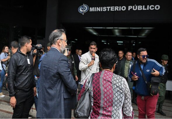 Opposition's National Primaries Commission (CNP) head, Jesús María Casal, entering the Attorney General's Office in Caracas. Photo: AFP.