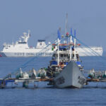 Chinese coast guard (back) conducts patrol missions in the waters near Huangyan Island in the South China Sea on September 20, 2023. Photo: VCG.