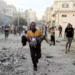 Calling Israel’s bombing of Palestinian civilians an act of ‘self-defence’ is a disingenuous labelling of Israel’s actions: a Palestinian man carries a wounded girl at the site of Israeli strikes, in Khan Younis in the southern Gaza Strip, October 14, 2023. Photo: Reuters.