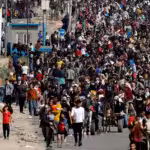 Palestinians fleeing north Gaza walk towards the south, in the central Gaza Strip, November 9. Photo: Mohammed Salem/Reuters.
