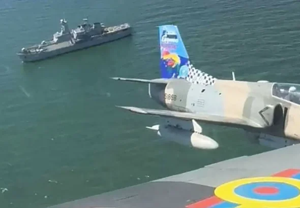 China-made K8 fighter jets overflying a Venezuelan Navy ship participating in the military drill near the border with Guyana. Photo: X/@dhernandezlarez.