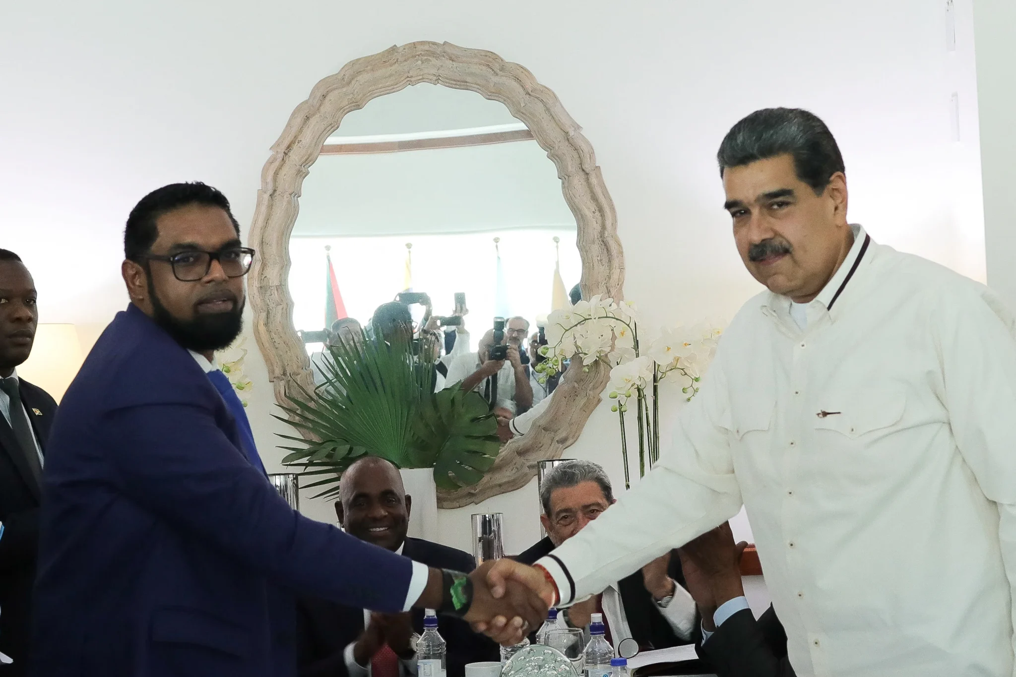 Venezuelan President Nicolás Maduro and Guyanese President Irfaan Ali shake hands as they meet amid tensions over the Essequibo dispute, in Kingstown, St. Vincent and the Grenadines, Thursday December 14, 2023. Photo: Presidential Press.
