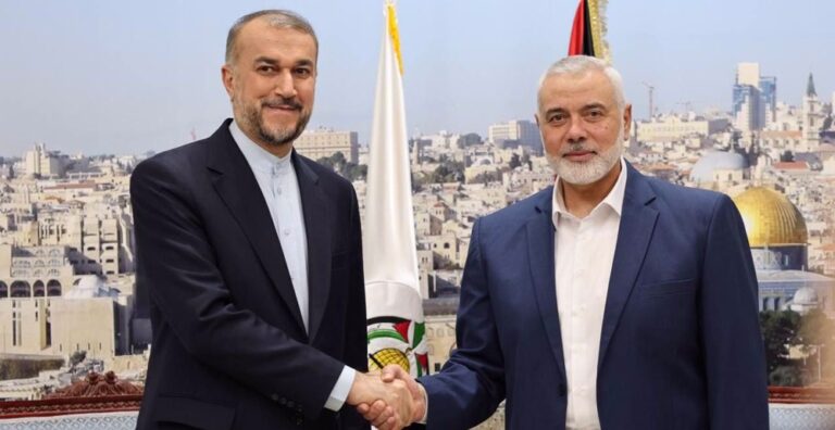 Iran's Foreign Minister Hossein Amir-Abdollahian (L) shakes hands with Ismail Haniyeh, head of the political bureau of the Palestinian Hamas resistance group, in Doha, Qatar, on December 20, 2023. Photo: the Iranian Foreign Ministry.