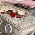 Newborn baby in an incubator. Photo: Jennifer Aniston.