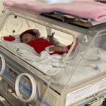 Newborn baby in an incubator. Photo: Jennifer Aniston.