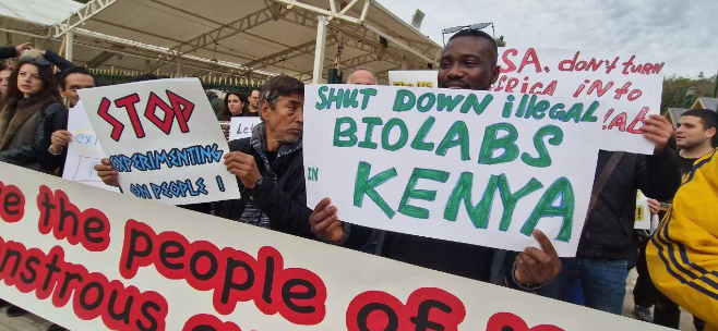 People in Kenya protesting biolabs with banners that read “shut down illegal biolabs in Kenya.” Photo: Batko Milacic.