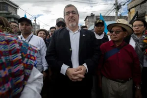 Guatemalan President-elect Bernardo Arévalo (center) marches with supporters and political and indigenous leaders, in Guatemala City, Guatemala, December 7, 2023. Photo: EFE/David Toro.