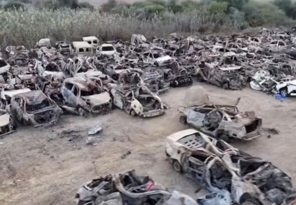 Drone footage released by the Israeli military in November shows the extent of the destruction of the cars fleeing the Supernova rave on October 7, likely inflicted by Israeli drones and helicopters. Photo: RT/Israeli military.