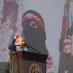 Deputy Secretary-General of the Popular Front for the Liberation of Palestine, Jamil Mezher, during the central festival commemorating the 55th anniversary of the Front’s launch in Al-Katiba Square in Gaza City on December 2022. Photo: Ali Jadallah/File photo.