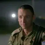 Brigadier General Barak Hiram on Israeli media casually admitting the war crimes he committed, such as killing 12 Israeli civilians (including children) in their homes. Photo: Uvda.