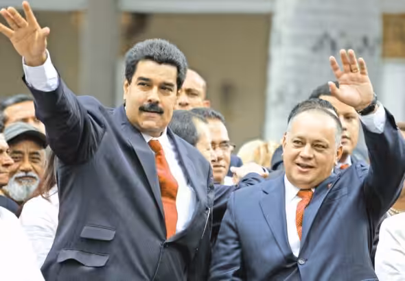 Venezuelan President Nicolás Maduro (left) and Deputy Diosdado Cabello (right) during a ceremony in Venezuela's National Assembly in 2013. Photo: Carlos Garcia Rawlins/Reuters/File photo.