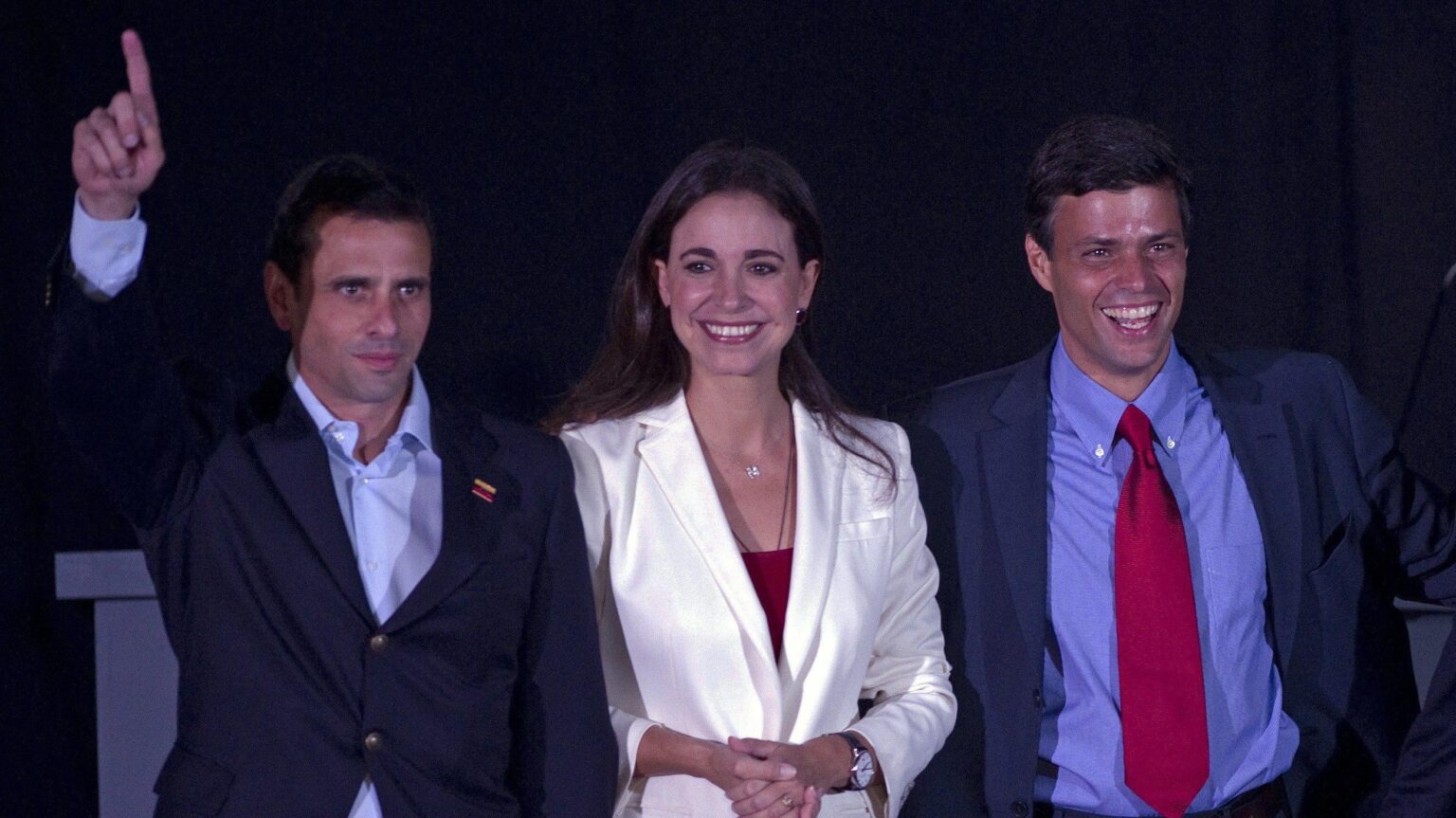 A photo from early 2000s showing Venezuelan far-right politicians María Corina Machado (center) accompanied by Henrique Capriles (left) and Leopoldo López (right). Photo: Getty Images/File photo.