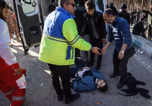 Iranian emergency services arrive at the site in Kerman, Iran, where two explosions killed at least 103 people. Photo: MEHR News.