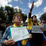 Ecuadorians protest against the planned installation of a US military base in the Galapagos Islands, Quito, June 17, 2019. Photo: Dolores Ochoa/AP.