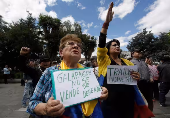 Ecuadorians protest against the planned installation of a US military base in the Galapagos Islands, Quito, June 17, 2019. Photo: Dolores Ochoa/AP.