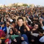 Imran Khan supporters rally with the ex-prime minister's picture. File photo.