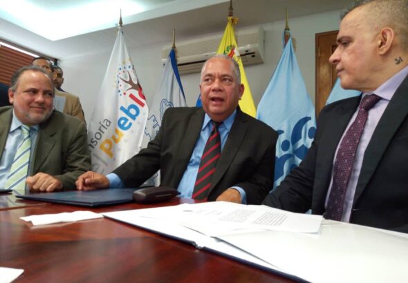 Former Venezuelan comptroller general Elvis Amoroso (center) alongside attorney general Tarek William Saab (right) and ombudsperson Alfredo Ruiz during a meeting in 2019. File photo.
