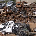 Vehicles stacked up near the southern Israeli town of Netivot, near Gaza, in November 2023. They were destroyed soon after Palestinian fighters began taking captives on 7 October. A new investigation by Israeli journalists has concluded that 70 such vehicles were blown up by Israeli fire. Photo: Jim Hollander/UPI.