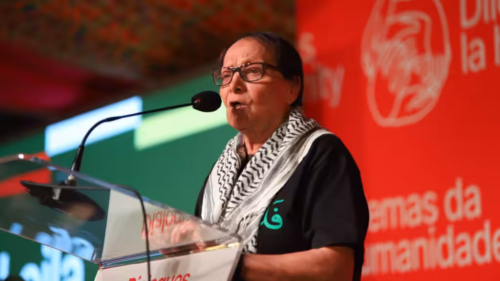 Leila Khaled speaks ash the Third Dilemmas of Humanity Conference organized by the International People's Assembly, hosted in Johannesburg. Photo: Rafa Stedile.