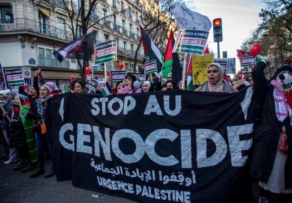 Protesters call for an end to the genocide in Gaza during a demonstration in Paris, 17 December. Photo: Anne Paq Active Stills.