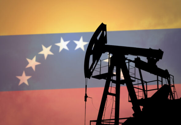 Photo collage composition displaying an oil rig with a Venezuelan flag in the background. Photo: Anton Watman/Shutterstock.