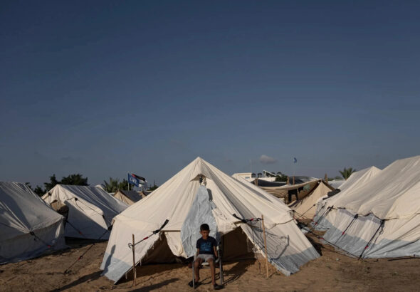 A Palestinian child now a refugee living in this tent because of the Israeli genocide. Photo: Getty Images.