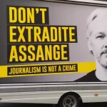'Don't Extradite Assange: Journalism Is Not A Crime,' reads the text on the wall of the a van. Photo: Mohamed Elmaazi.