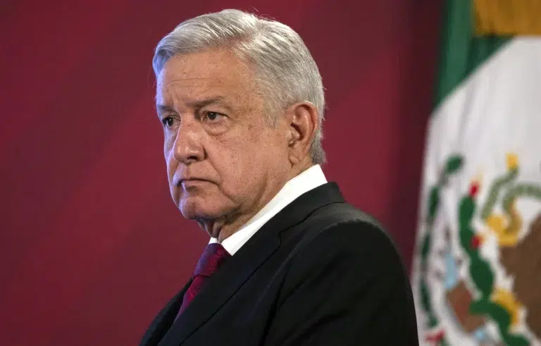 Mexico's President Andres Manuel Lopez Obrador arrives for his daily, morning news conference at the presidential palace, Palacio Nacional, in Mexico City, on July 13, 2020. Photo: Marco Ugarte/AP file.