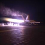 Handout photo provided by the US Navy shows a warplane taking off from the flight deck of the USS Dwight D. Eisenhower aircraft carrier for an operation in the West Asia region on January 22, 2024. Photo: PressTV.