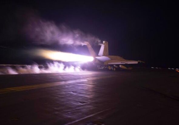 Handout photo provided by the US Navy shows a warplane taking off from the flight deck of the USS Dwight D. Eisenhower aircraft carrier for an operation in the West Asia region on January 22, 2024. Photo: PressTV.