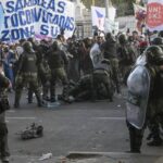 Argentinian police clash with protesters outside the Congress while lawmakers debate the Omnibus bill. Photo: Juan Mabromata/AFP.