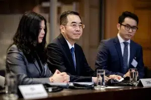 Ma Xinmin (center), Director General of the Department of Treaty and Law of China's Ministry of Foreign Affairs, attends a hearing at the International Court of Justice in The Hague on the legal consequences of the Israeli occupation of the Palestinian territories, on February 22, 2024. Photo: Robin van Lonkhuijsen/ANP/AFP.