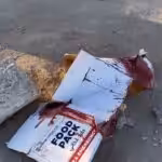 A smashed box of humanitarian food aid stained with blood, after the latest massacre by Israeli occupation forces that killed at least 104 people in Al-Nabulsi, Palestine, on February 29, 2024. Photo: X/@madhoun95.