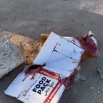 A smashed box of humanitarian food aid stained with blood, after the latest massacre by Israeli occupation forces that killed at least 104 people in Al-Nabulsi, Palestine, on February 29, 2024. Photo: X/@madhoun95.