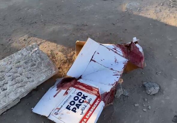A smashed box of humanitarian food aid stained with blood, after the latest massacre by Israeli occupation forces that killed at least 104 people in Al-Nabulsi, Palestine, on February 29, 2024. Photo: X/@madhoun95.