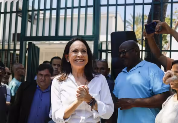 Venezuelan far-right opposition politician María Corina Machado among supporters. File photo.