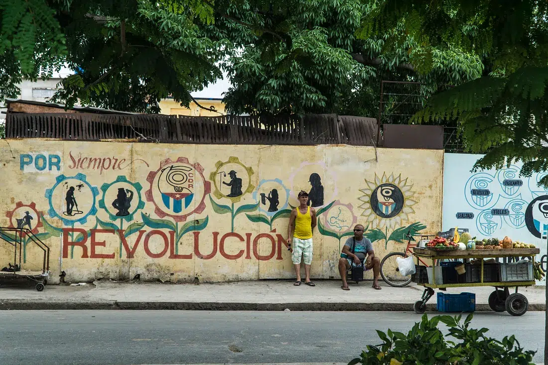 A mural in Cuba with the words "Revolution forever." Photo: Guille Álvarez.